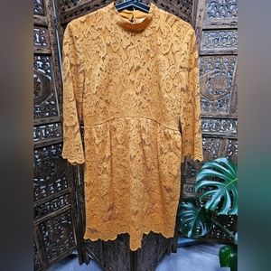 Beautiful vintage inspired lace dress with 3/4 sleeves.